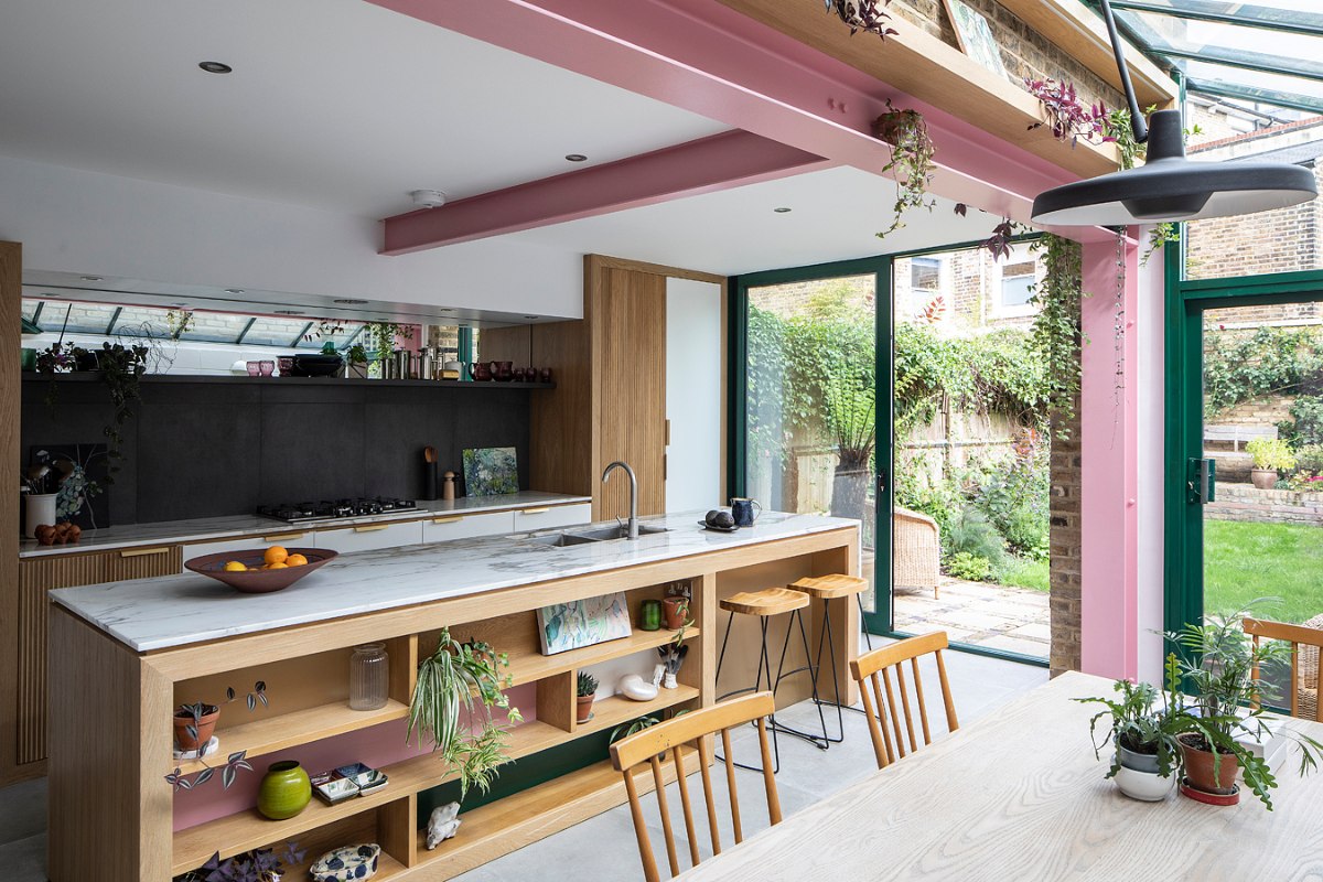 Large renovation with pink steel beams and glazing