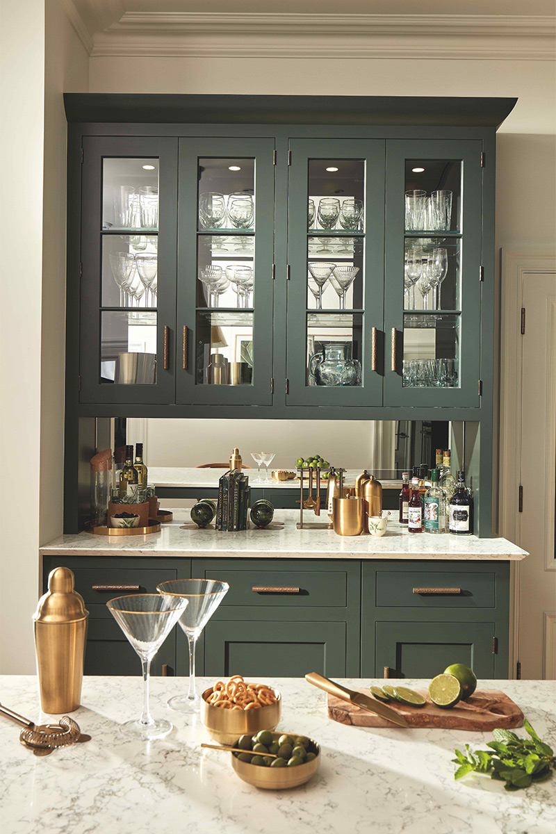 Large glass and drinks storage with green cabinet 