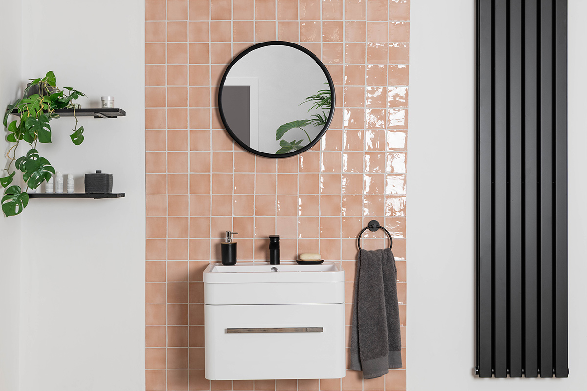 Modern bathroom with tiles and white basin 